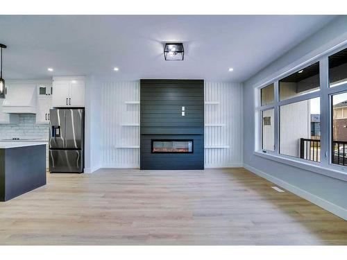 160 Saddlelake Manor Ne, Calgary, AB - Indoor With Fireplace