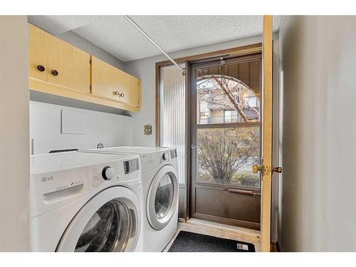 36 Canterbury Gardens Sw, Calgary, AB - Indoor Photo Showing Laundry Room