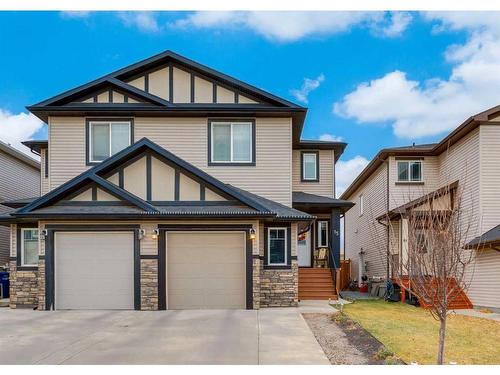 15 Baysprings Way Sw, Airdrie, AB - Outdoor With Facade