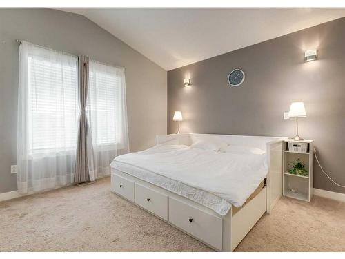 15 Baysprings Way Sw, Airdrie, AB - Indoor Photo Showing Bedroom