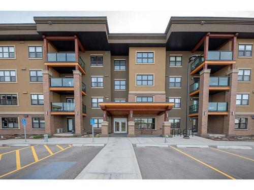 2407-10 Market Boulevard Se, Airdrie, AB - Outdoor With Balcony With Facade