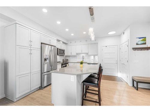 2407-10 Market Boulevard Se, Airdrie, AB - Indoor Photo Showing Kitchen With Upgraded Kitchen