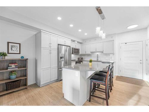 2407-10 Market Boulevard Se, Airdrie, AB - Indoor Photo Showing Kitchen With Upgraded Kitchen