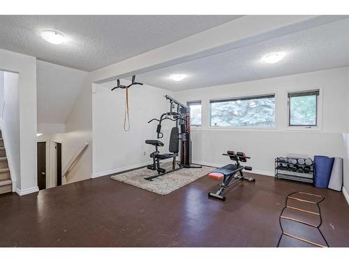 44 Dalbrook Bay Nw, Calgary, AB - Indoor Photo Showing Gym Room