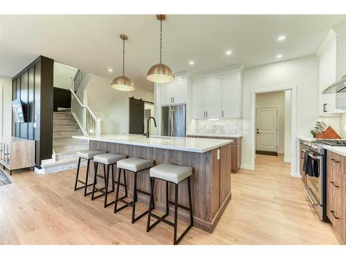 15 Bearberry Lane, Okotoks, AB - Indoor Photo Showing Kitchen With Upgraded Kitchen