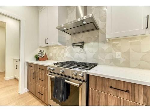 15 Bearberry Lane, Okotoks, AB - Indoor Photo Showing Kitchen With Upgraded Kitchen