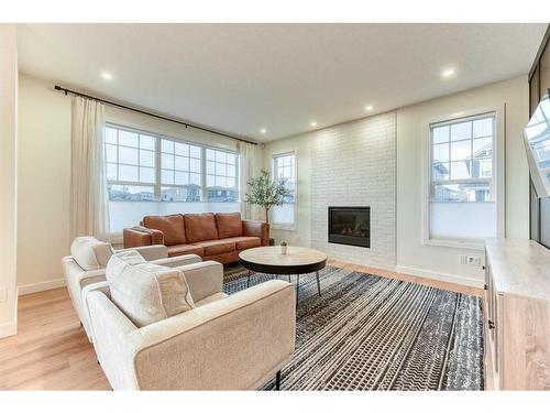 15 Bearberry Lane, Okotoks, AB - Indoor Photo Showing Living Room With Fireplace