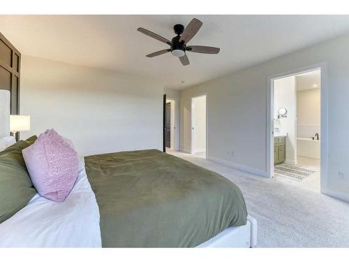 15 Bearberry Lane, Okotoks, AB - Indoor Photo Showing Bedroom