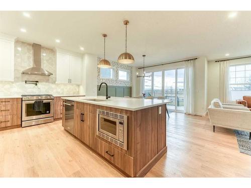 15 Bearberry Lane, Okotoks, AB - Indoor Photo Showing Kitchen With Upgraded Kitchen