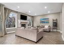 146 Auburn Sound Circle Se, Calgary, AB  - Indoor Photo Showing Living Room With Fireplace 