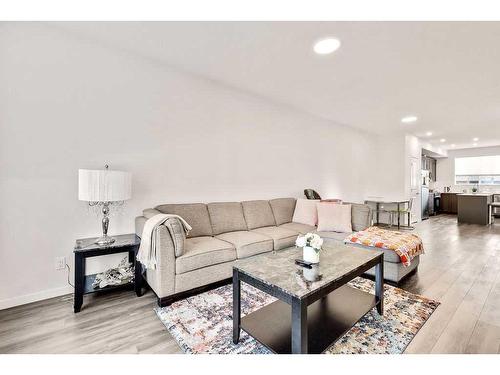 28 Edith Gate Nw, Calgary, AB - Indoor Photo Showing Living Room