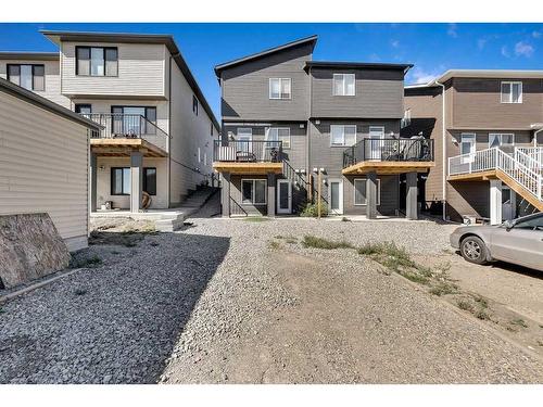 28 Edith Gate Nw, Calgary, AB - Outdoor With Deck Patio Veranda With Exterior