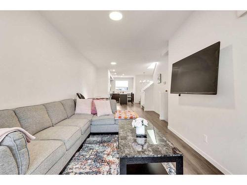 28 Edith Gate Nw, Calgary, AB - Indoor Photo Showing Living Room