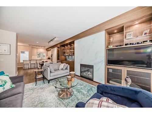 1906 12 Street Sw, Calgary, AB - Indoor Photo Showing Living Room With Fireplace