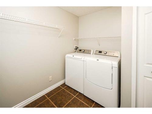 59 Somerset Manor Sw, Calgary, AB - Indoor Photo Showing Laundry Room