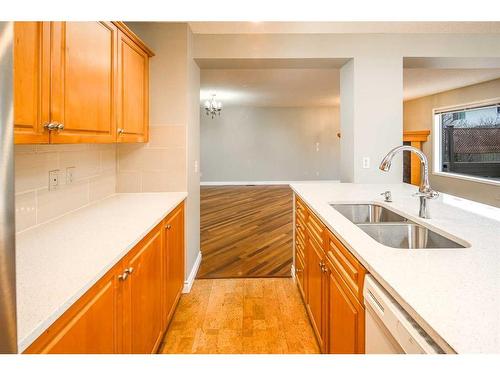 59 Somerset Manor Sw, Calgary, AB - Indoor Photo Showing Kitchen With Double Sink