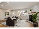 720 Alderwood Place Se, Calgary, AB  - Indoor Photo Showing Living Room With Fireplace 