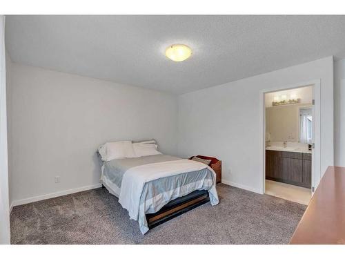 58 Masters Crescent Se, Calgary, AB - Indoor Photo Showing Bedroom