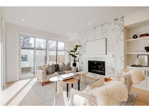 3727 Richmond Road Sw, Calgary, AB - Indoor Photo Showing Living Room With Fireplace