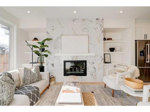 3727 Richmond Road Sw, Calgary, AB - Indoor Photo Showing Living Room With Fireplace