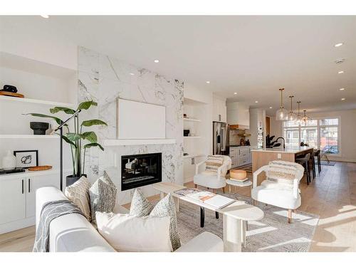 3727 Richmond Road Sw, Calgary, AB - Indoor Photo Showing Living Room With Fireplace