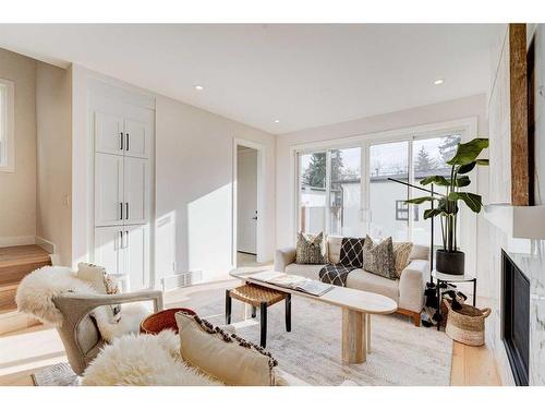 3727 Richmond Road Sw, Calgary, AB - Indoor Photo Showing Living Room With Fireplace