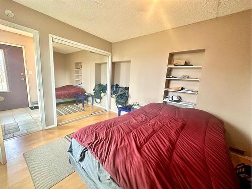 2303 23 Street, Nanton, AB - Indoor Photo Showing Bedroom