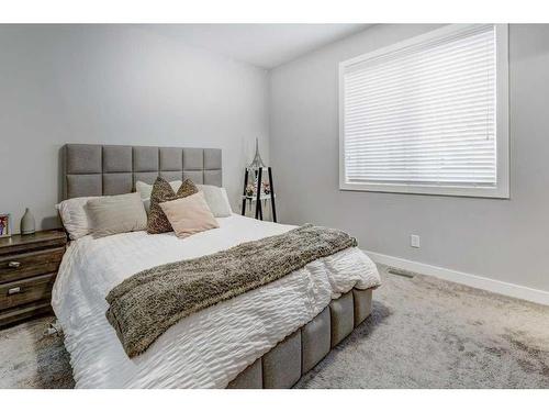 706 Redstone Crescent Ne, Calgary, AB - Indoor Photo Showing Bedroom