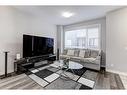 706 Redstone Crescent Ne, Calgary, AB  - Indoor Photo Showing Living Room 