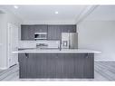 600 Baywater Manor Sw, Airdrie, AB  - Indoor Photo Showing Kitchen With Upgraded Kitchen 