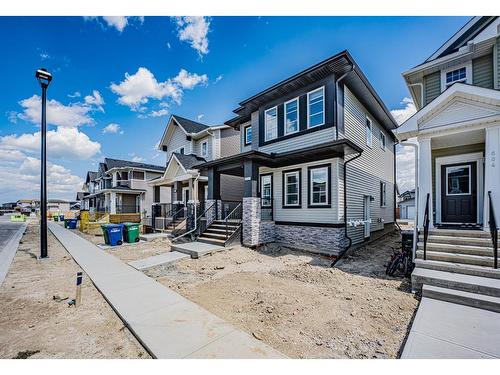 600 Baywater Manor Sw, Airdrie, AB - Outdoor With Facade