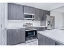 600 Baywater Manor Sw, Airdrie, AB  - Indoor Photo Showing Kitchen 