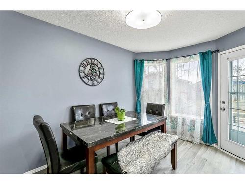 16 Cramond Drive Se, Calgary, AB - Indoor Photo Showing Dining Room