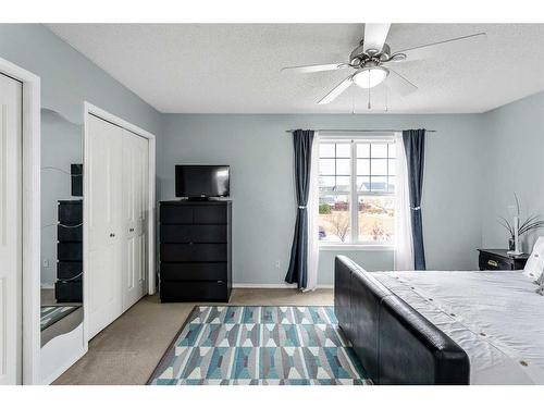 16 Cramond Drive Se, Calgary, AB - Indoor Photo Showing Bedroom