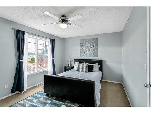 16 Cramond Drive Se, Calgary, AB - Indoor Photo Showing Bedroom