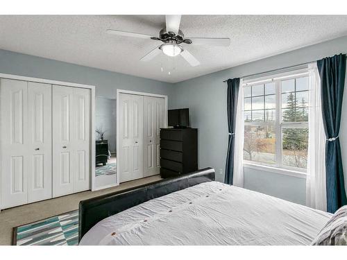 16 Cramond Drive Se, Calgary, AB - Indoor Photo Showing Bedroom