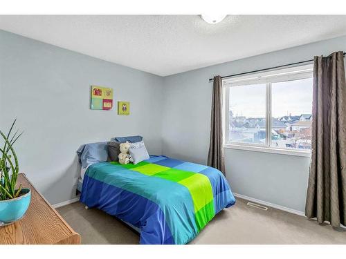 16 Cramond Drive Se, Calgary, AB - Indoor Photo Showing Bedroom