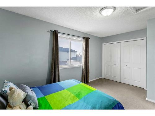 16 Cramond Drive Se, Calgary, AB - Indoor Photo Showing Bedroom