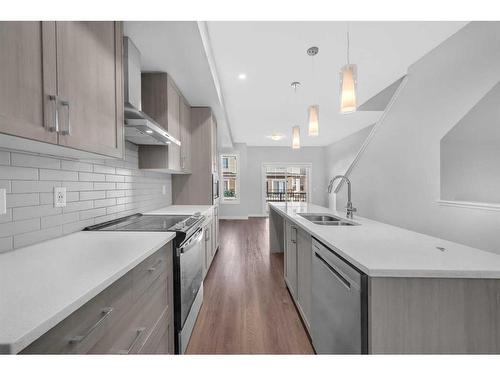 926 Sage Hill Grove Nw, Calgary, AB - Indoor Photo Showing Kitchen With Double Sink With Upgraded Kitchen