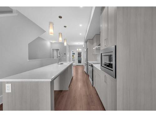 926 Sage Hill Grove Nw, Calgary, AB - Indoor Photo Showing Kitchen With Upgraded Kitchen