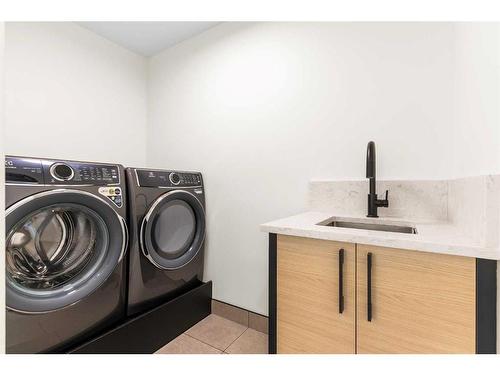 476 West Chestemere Drive, Chestermere, AB - Indoor Photo Showing Laundry Room