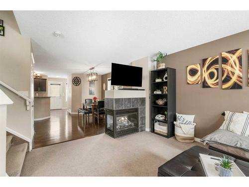 42 Silverado Plains Manor Sw, Calgary, AB - Indoor With Fireplace