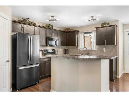 42 Silverado Plains Manor Sw, Calgary, AB - Indoor Photo Showing Kitchen With Upgraded Kitchen