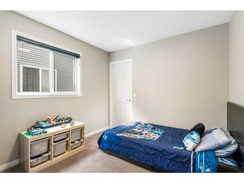 42 Silverado Plains Manor Sw, Calgary, AB - Indoor Photo Showing Bedroom