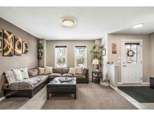 42 Silverado Plains Manor Sw, Calgary, AB - Indoor Photo Showing Living Room