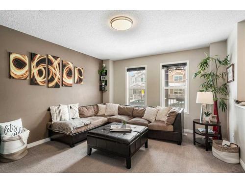 42 Silverado Plains Manor Sw, Calgary, AB - Indoor Photo Showing Living Room