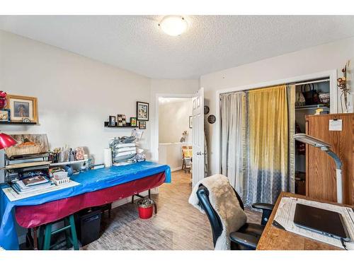 11-117 Bow Ridge Drive, Cochrane, AB - Indoor Photo Showing Other Room