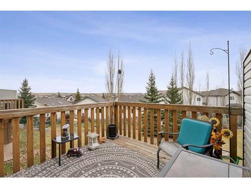 11-117 Bow Ridge Drive, Cochrane, AB - Outdoor With Deck Patio Veranda