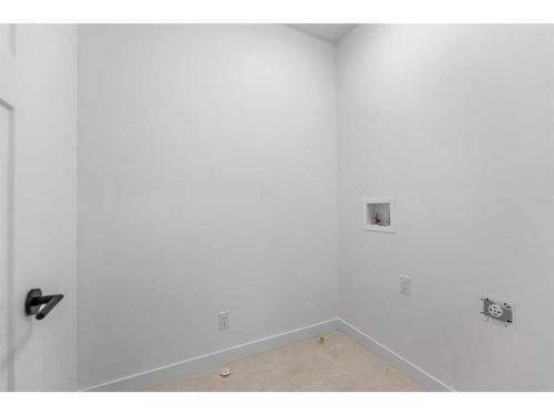 400-15 Coopersfield Sw, Airdrie, AB - Indoor Photo Showing Other Room