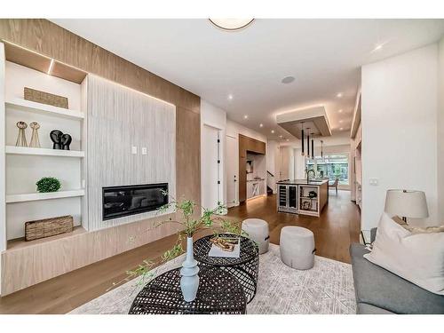 2431 6 Avenue Nw, Calgary, AB - Indoor Photo Showing Living Room With Fireplace